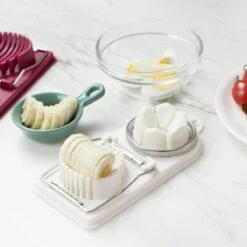 IGOODS Professionele Eiersnijder - Egg Slicer - Metalen Snijdraden - Eiersnijder - Sterke Houder - Stalen Eisnijder - Eisnijder - Ei-snijder - Ei Snijder - Drie Kleuren- Bordeaux -Merkloos Winkel 1200x1200 3166