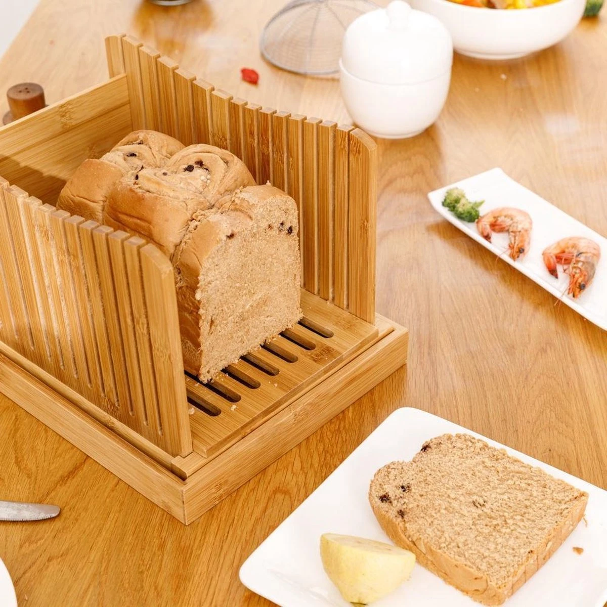 Merkloos Decopatent® Broodsnijder Bamboe - Hulpmiddel Voor Brood Snijden - Broodplank - Kruimelvanger 6 Merkloos Decopatent® Broodsnijder Bamboe - Hulpmiddel Voor Brood Snijden - Broodplank - Kruimelvanger - Afbeelding 6