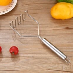 YUGN Pureestamper Aardappelstamper Stamper - Pureerder Stampotstamper - RVS - Cadeau Tip -Merkloos Winkel 1200x1200 3839